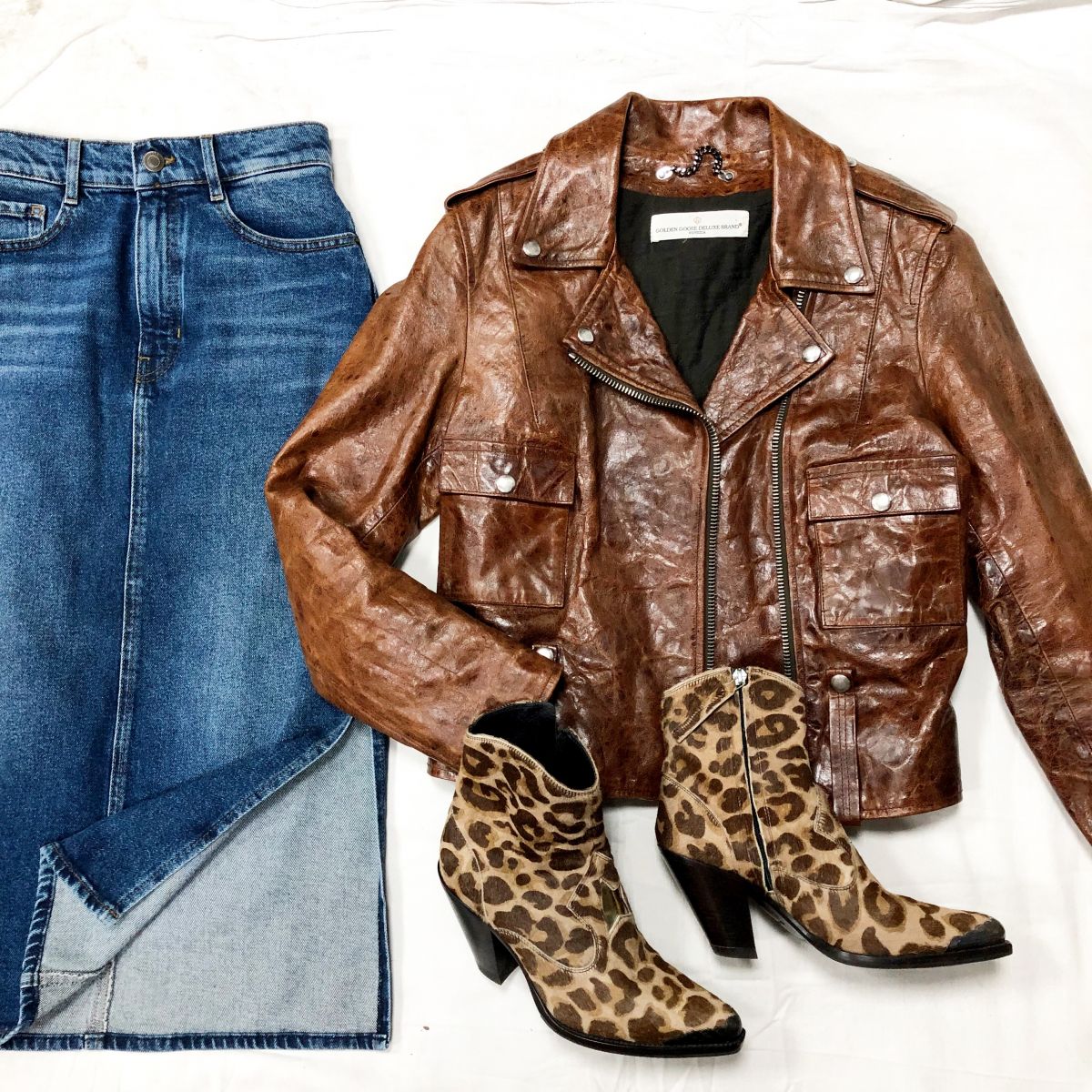 Куртка GOLDEN GOOSE BREND DELUXE размер S цена 31 310 руб 
Юбка BOSS размер S цена 6 265 руб 
Казаки Golden Goose Brand Deluxe размер 36 цена 15 655 руб