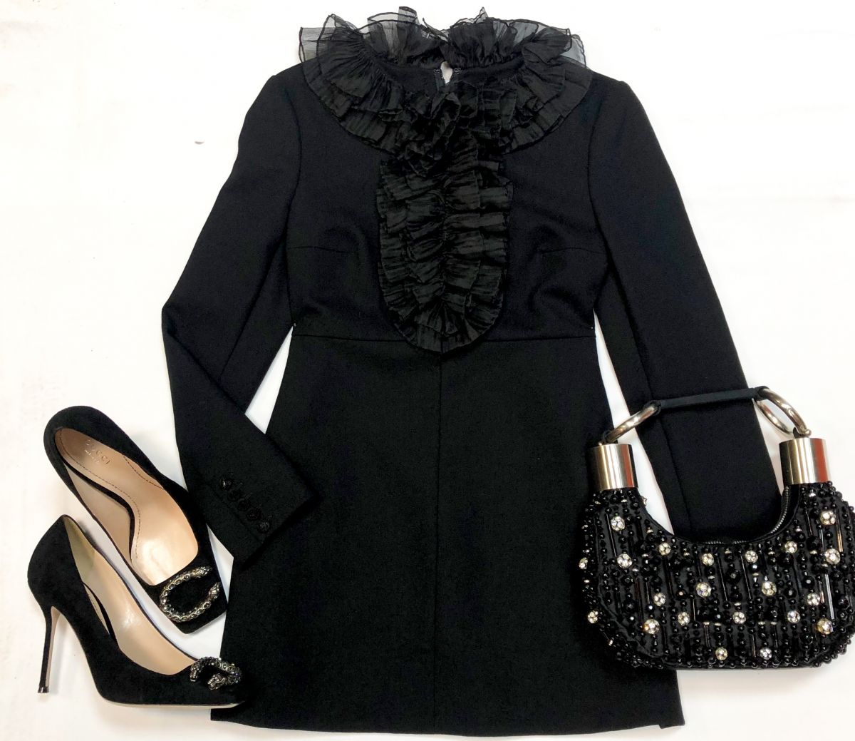 Платье SAINT LAURENT размер 38 цена 23 078 руб 
Туфли GUCCI размер 39 цена 23 078 руб 
Сумочка Chloe