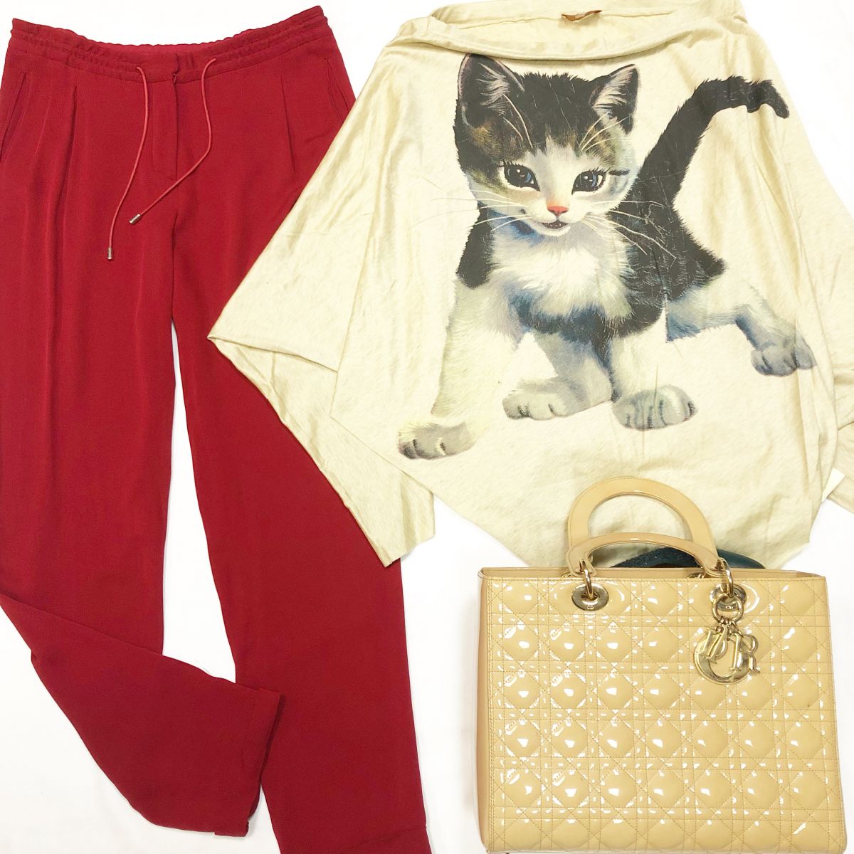 Кофта - туника Vivienne Westwood размер S цена 4 616 руб Брюки /шёлк/ Loro Piana размер 42 цена 10 770 руб Сумка Christian Dior