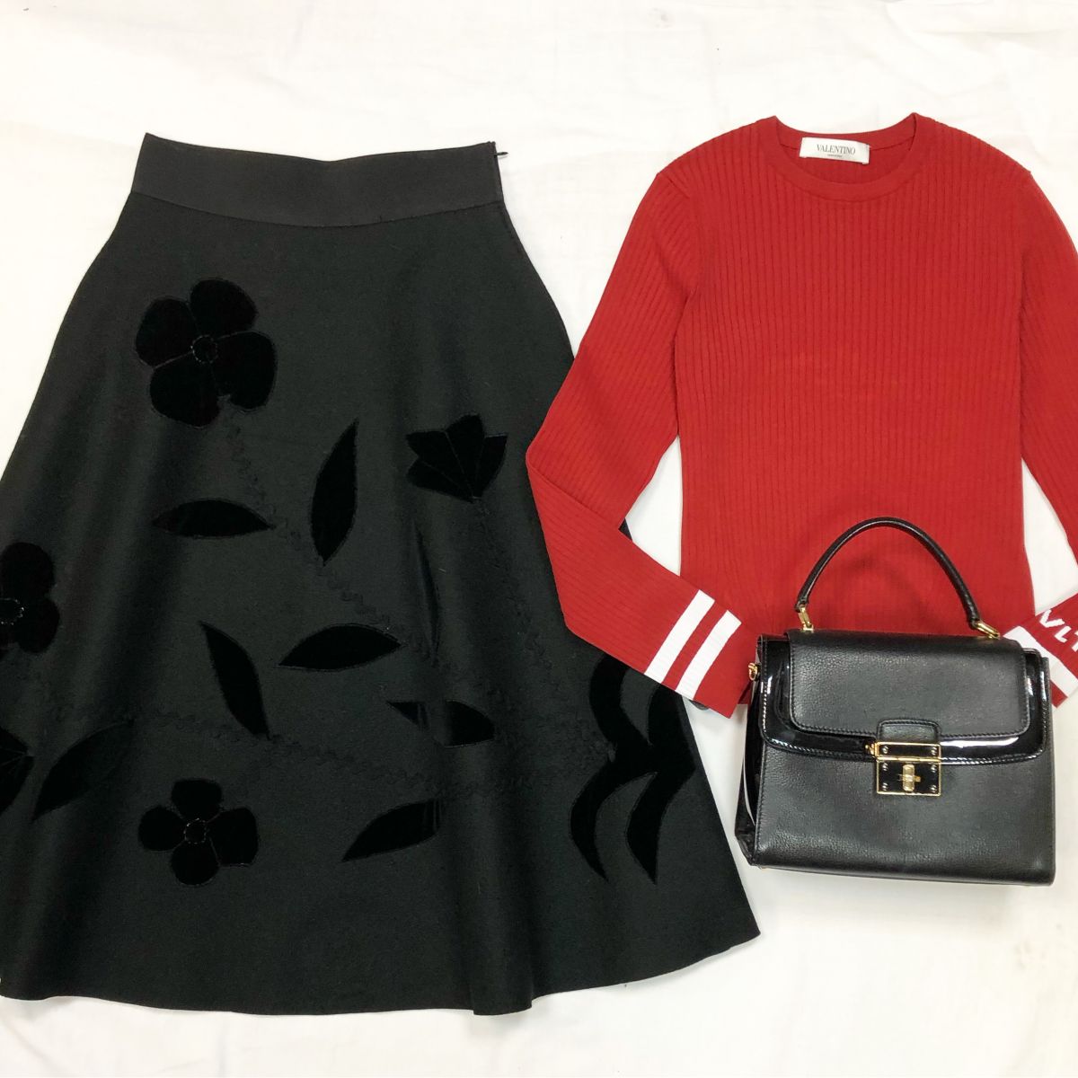 Кофта Valentino размер L цена 15 385 руб Юбка размер 42 цена 7 693 руб Сумка Dolce Gabbana