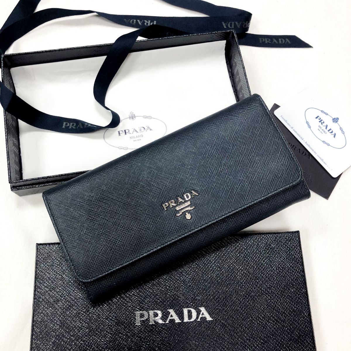 Кошелек PRADA цена 18 462 руб /коробка/карточка/упаковка/