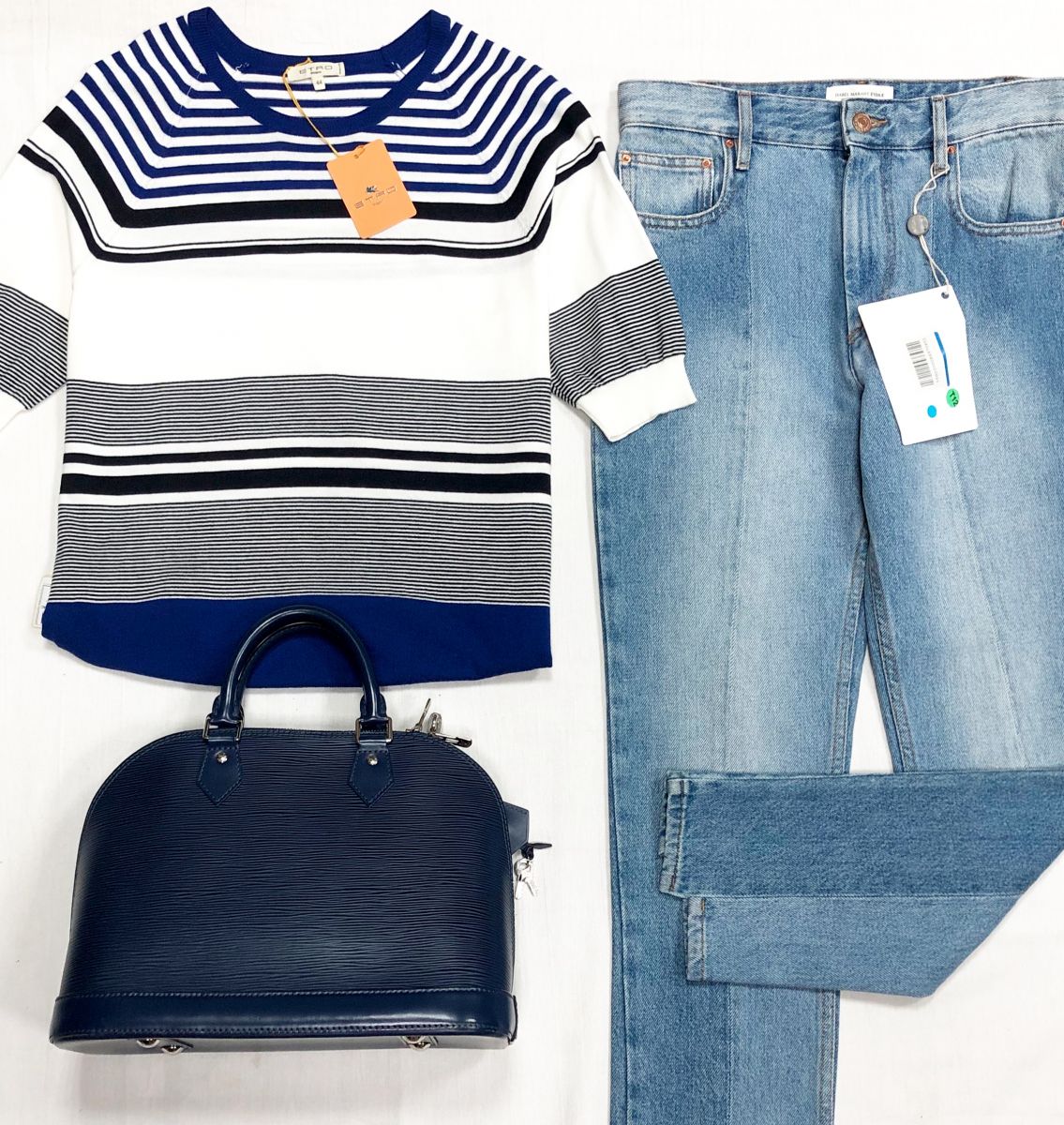 Кофта ETRO размер 44 цена 8 610 руб
Джинсы Isabel Marant размер 36 цена 7 693 руб
Сумка Louis Vuitton