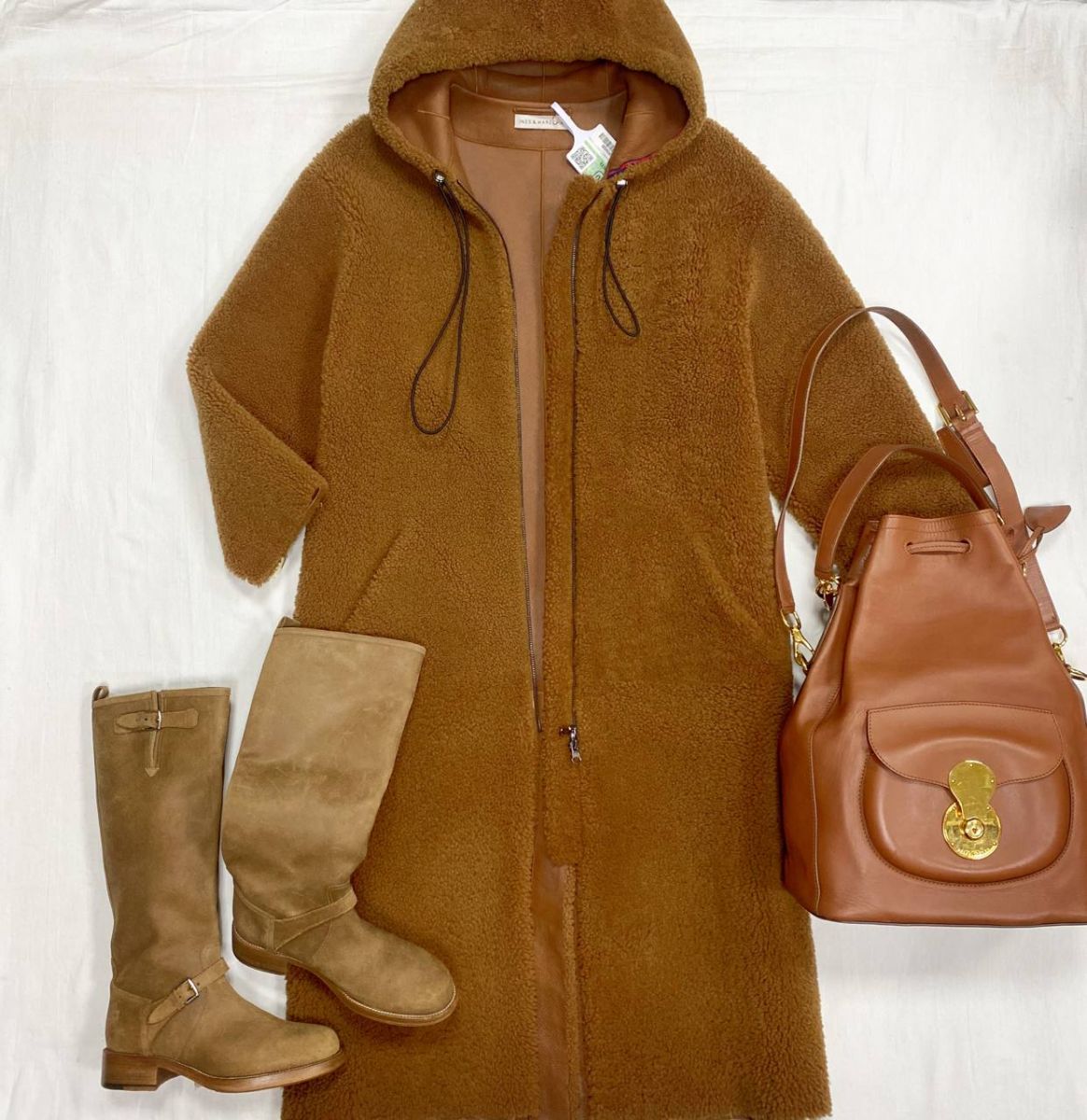 Дублёнка Ines &amp; Marechal размер 38 цена 78 275 руб
Сапоги Hermès размер 36.5 цена 46 965 руб 
Сумка Ralph Lauren