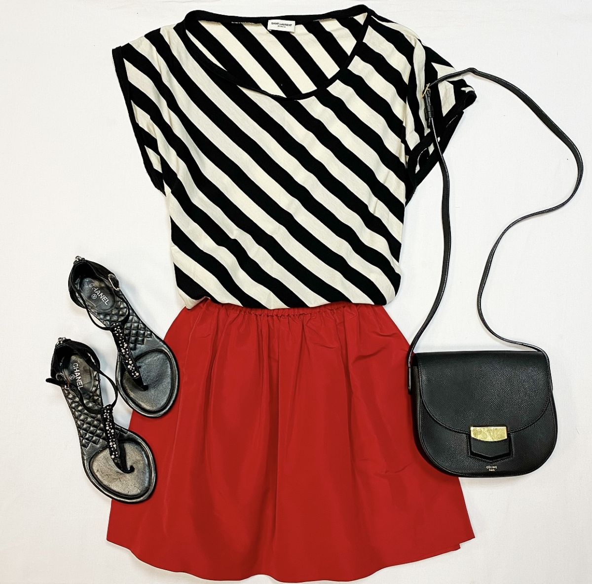 Майка Saint Laurent размер M цена 12 308 рубЮбка Miu Miu размер 38 цена 7 693 рубБосоножки Chanel размер 37 цена 10 770 руб Сумка Celine