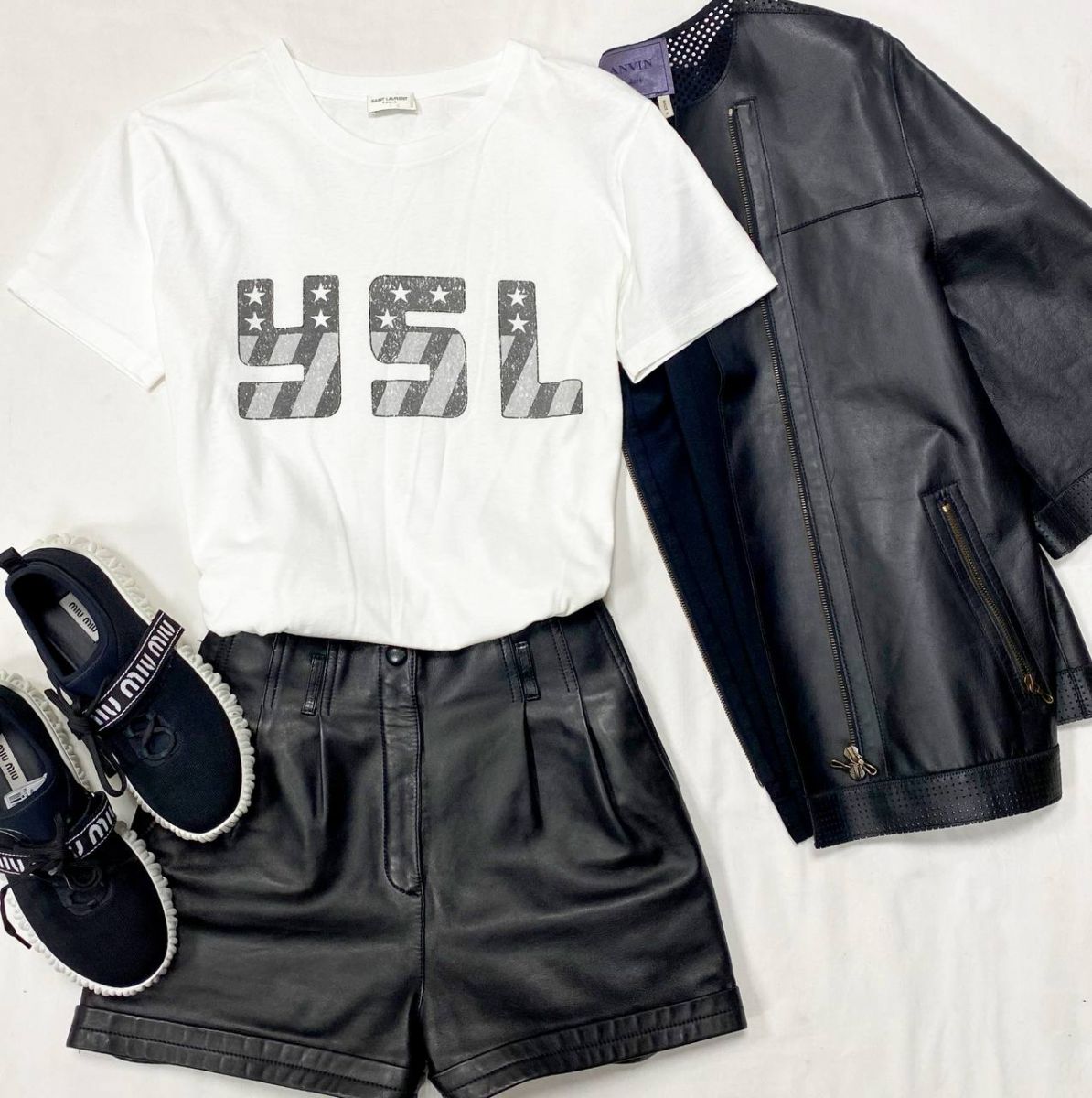 Шорты / кожа / Saint Laurent размер 40 цена 46 965 руб 
Куртка Lanvin размер 42 цена 39 138 руб 
Футболка Saint Laurent размер M цена 7 828 руб 
Кеды Miu Miu размер 37 цена 31 310 руб