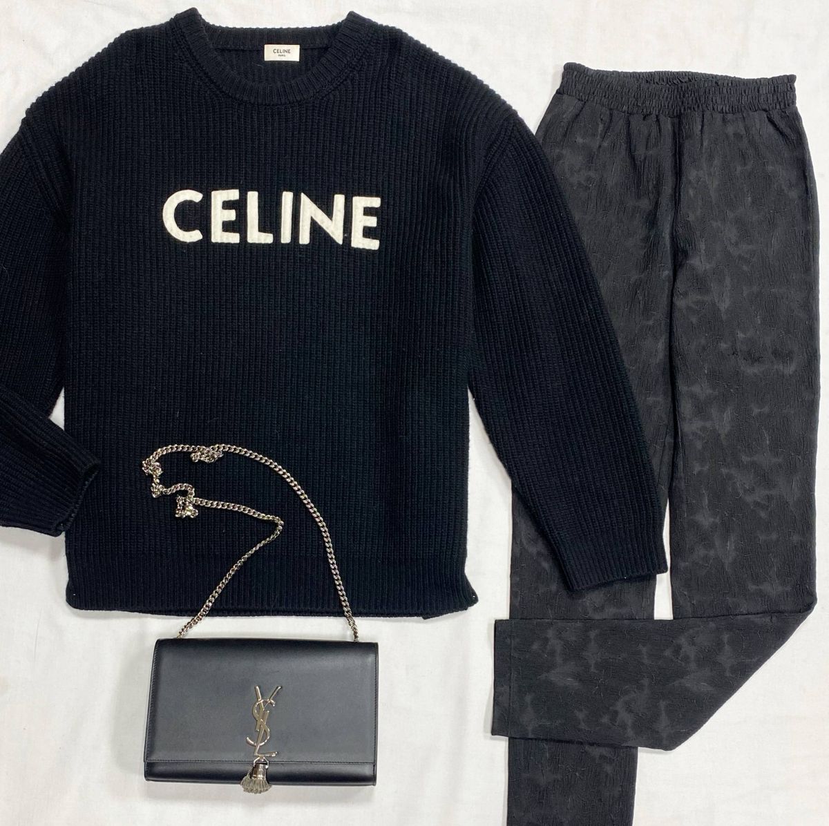 Свитер Celine размер S цена 46 965 руб
Брюки Chanel размер 38 цена 23 483 руб
Сумка Saint Laurent 