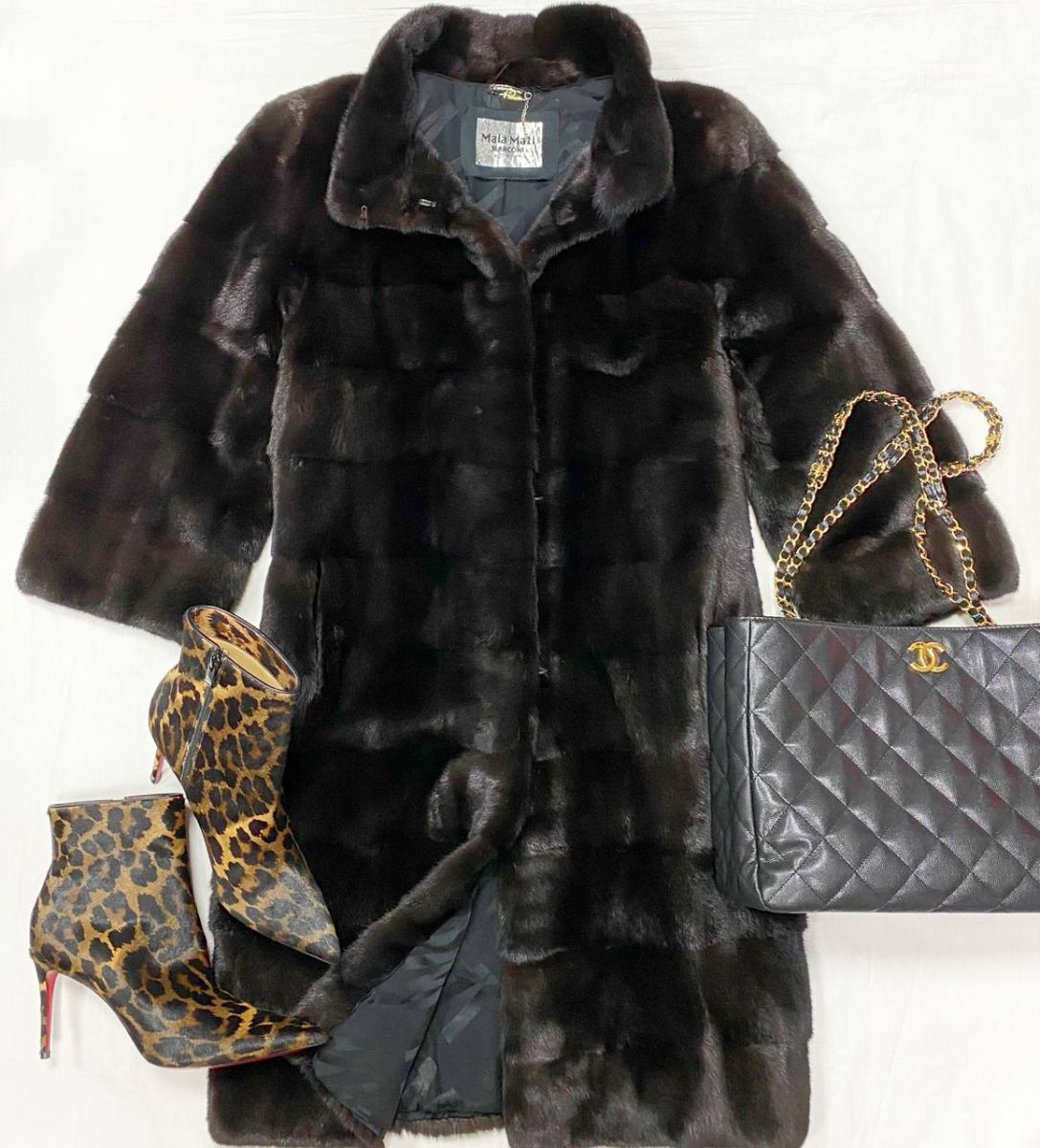 Шуба / мех норки / Mala Mati Marconi размер 44 цена 62 620 руб 
Ботильоны Louboutin размер 40 цена 70 448 руб 
Сумка Chanel