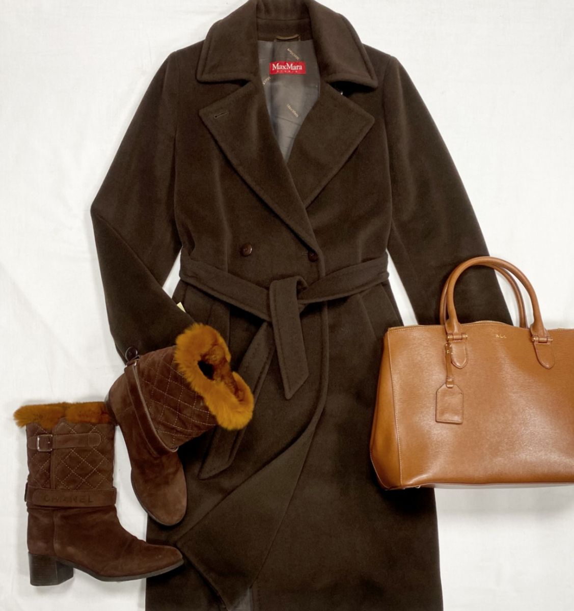 Пальто Max Mara размер 40 цена 31 310 руб 
Сапоги Chanel размер 40.5 цена 23 483 руб 
Сумка Ralph Lauren 