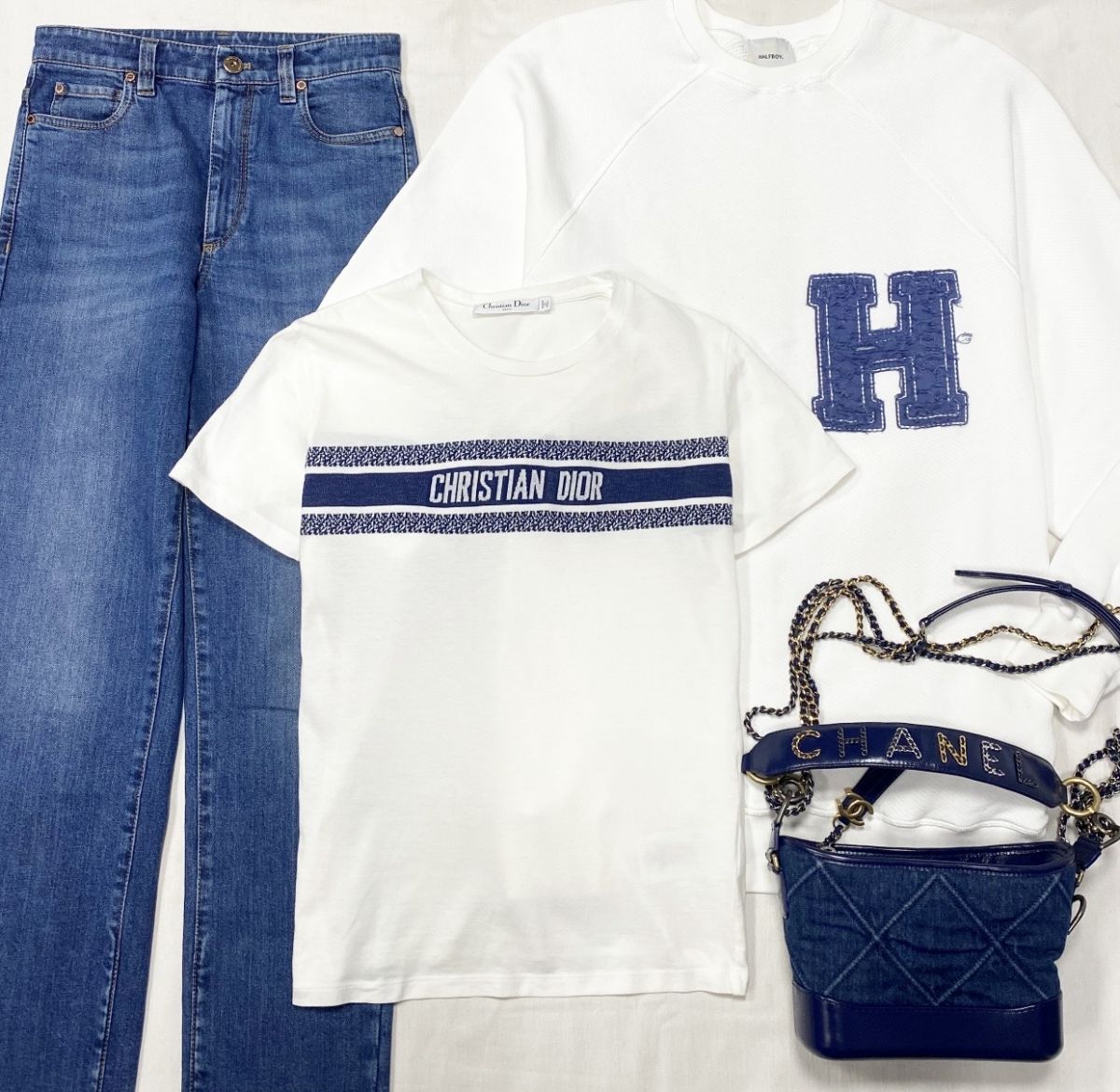 Футболка Christian Dior размер M цена 15 655 руб Толстовка HalfBoy размер XS цена 6 262 руб Джинсы Brunello Cucinelli размер 38 цена 23 483 руб Сумка Chanel