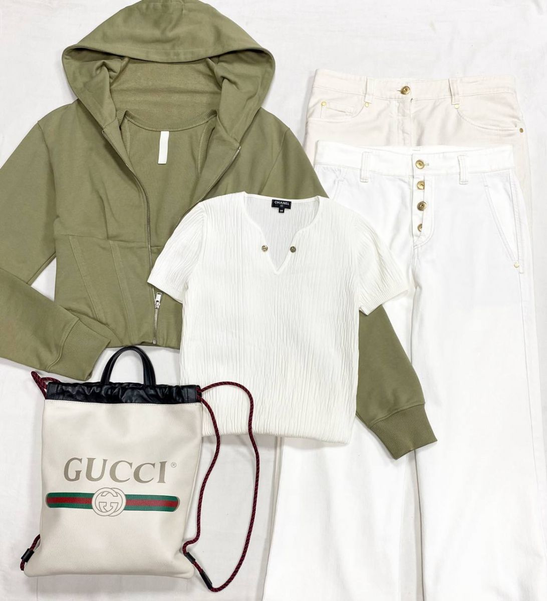 Кофта Chanel размер 38 цена 39 138 рубТолстовка Dion Lee размер 44 цена 31 310 рубДжинсы размер 42 цена по 46 965 рубРюкзак Gucci