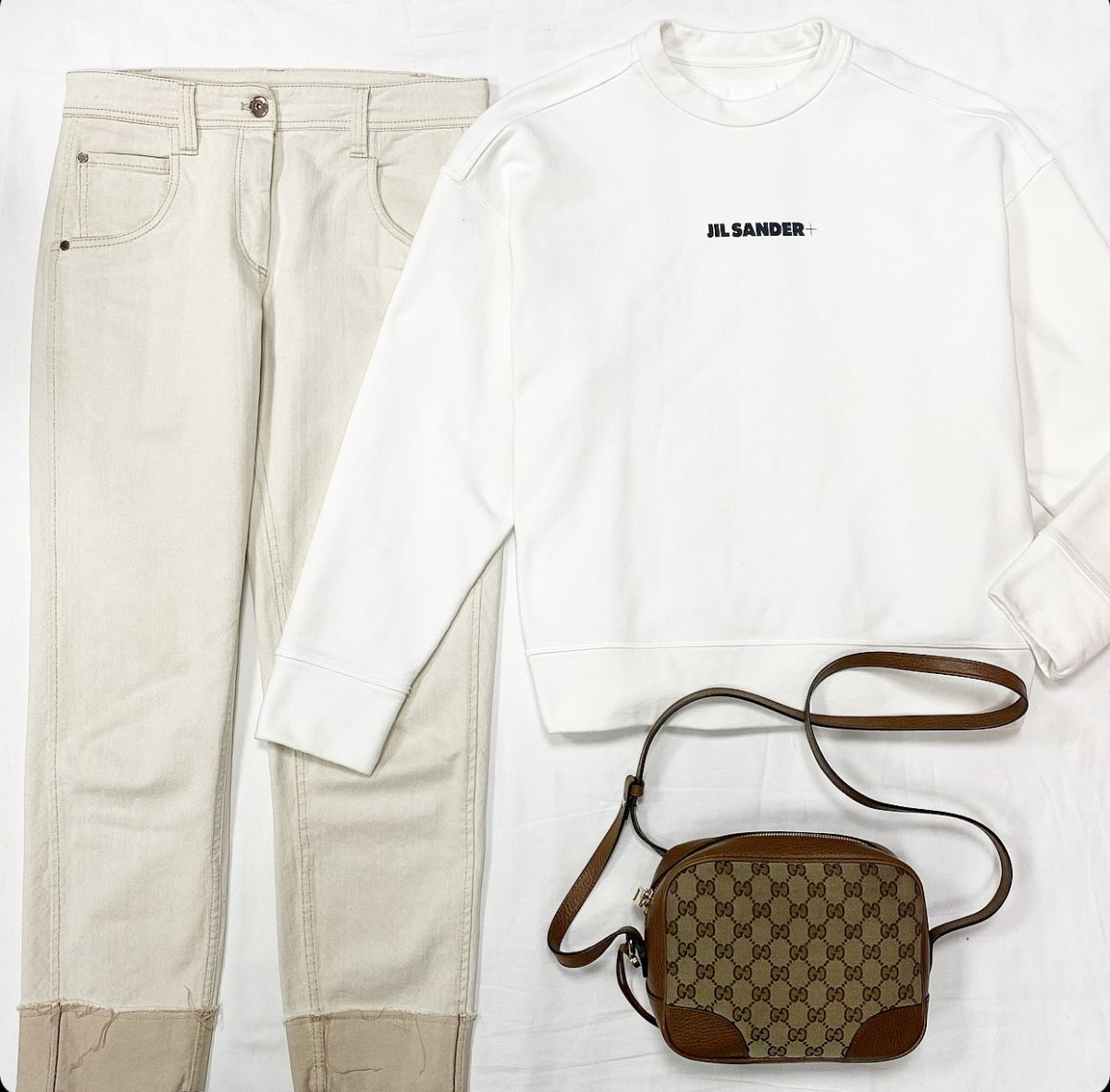 Джинсы Brunello Cucinelli размер 40 цена 15 385 рубТолстовка Jil Sander размер XS цена 23 078 руб Сумка Gucci