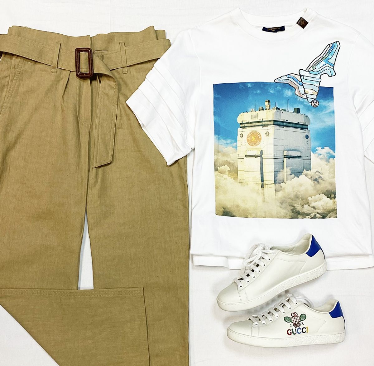 Футболка Louis Vuitton размер XS цена 23 078 рубБрюки Brunello Cucinelli размер 40 цена 15 385 руб Кеды Gucci размер 36 цена 23 078 руб