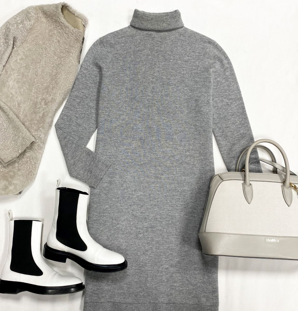 Платье Allude размер M цена 10 770 руб
Ботинки Jil Sander размер 37 цена 23 078 руб
Сумка Max Mara 