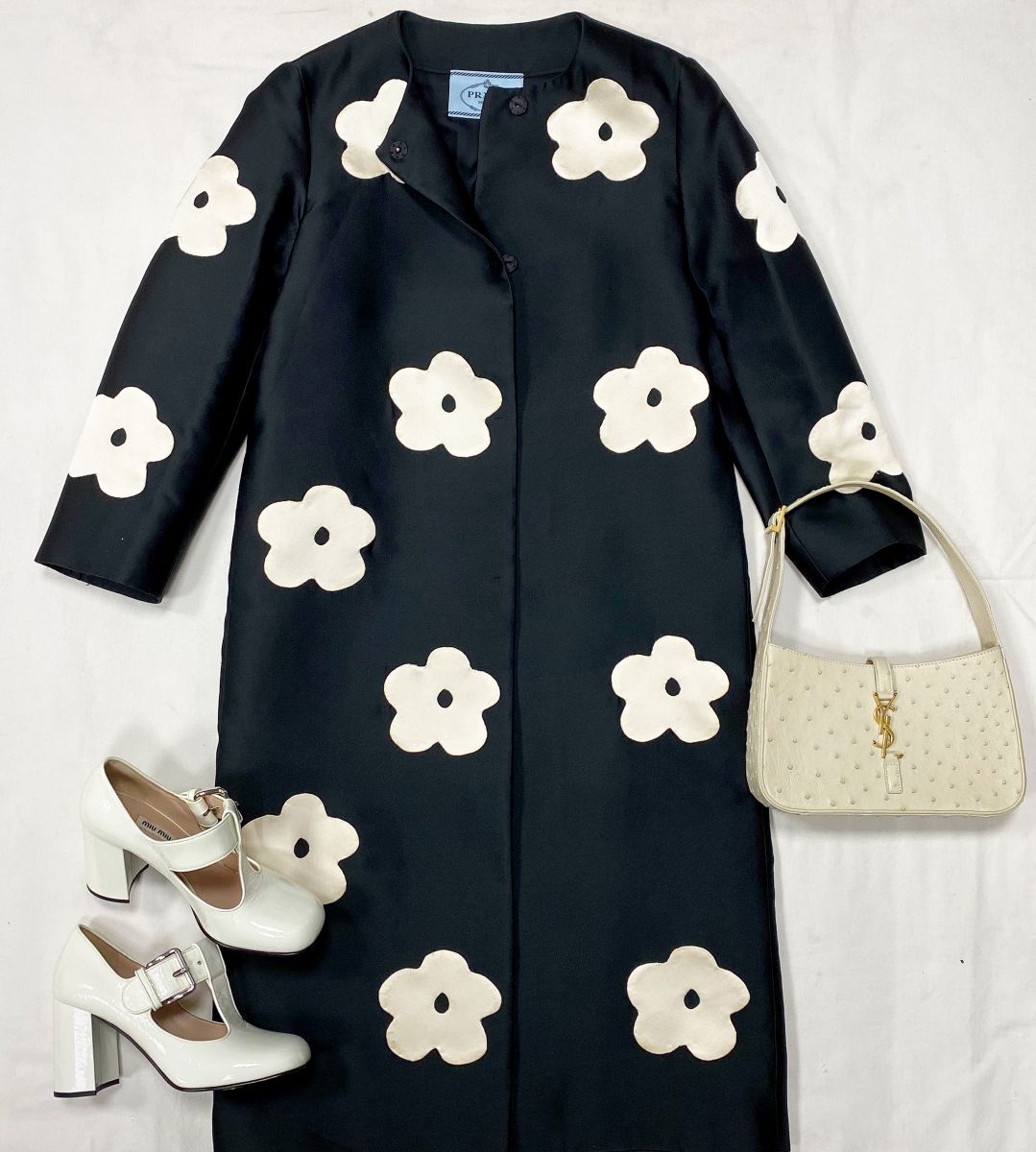 Пальто Prada размер 40 цена 37 572 руб Туфли Miu Miu размер 38 цена 18 786 руб Сумка Saint Laurent