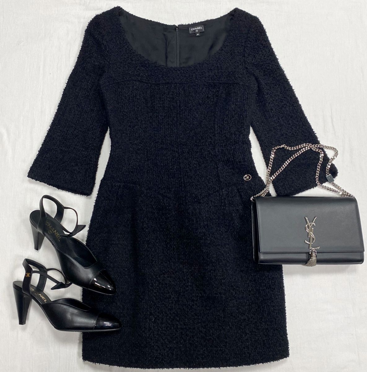 Платье / твид / люрекс / Chanel размер 40 цена 93 930 руб 
Босоножки Chanel размер 40 цена 125 240 руб 
Сумка Saint Laurent