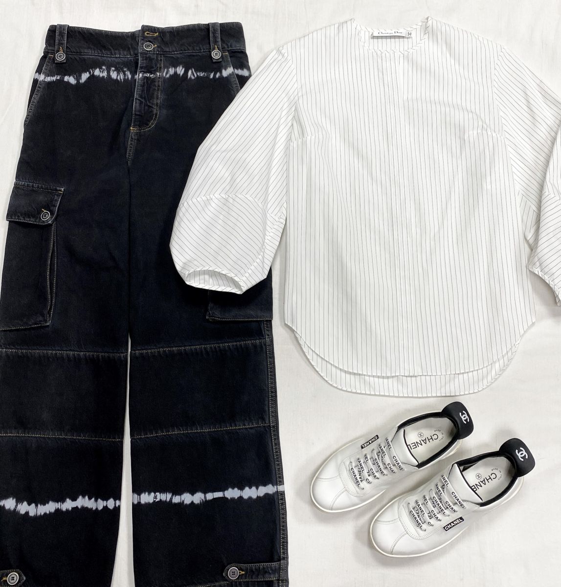 Блузка Christian Dior размер 34 цена 15 655 руб Джинсы Marni размер 38 цена 10 959 руб Кеды Chanel размер 39 цена 78 275 руб