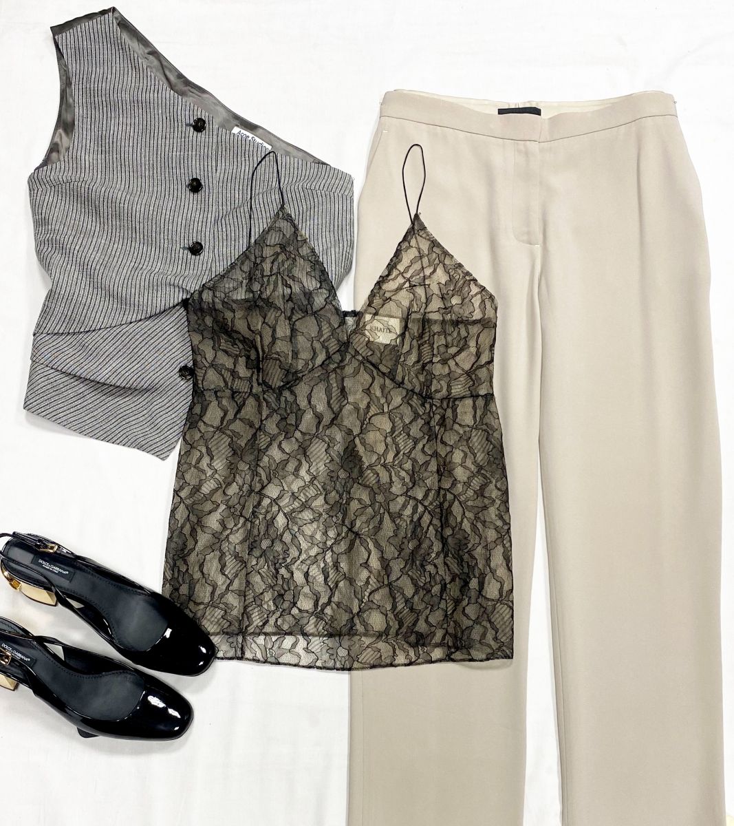 Топ /ажур/ Khaite размер 42 цена 46 965 рубТоп Acne Studios размер 42 цена 31 310 рубБрюки The Row размер 42 цена 23 483 рубБосоножки Dolce Gabbana размер 39 цена 39 138 руб