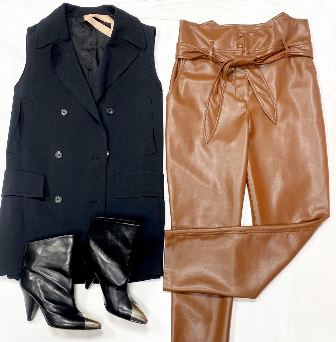 Жилет N21 размер 38 цена 12 308 руб
Брюки Nanushka размер M цена 9 231 руб
Ботильоны Isabel Marant размер 39 цена 23 078 руб
