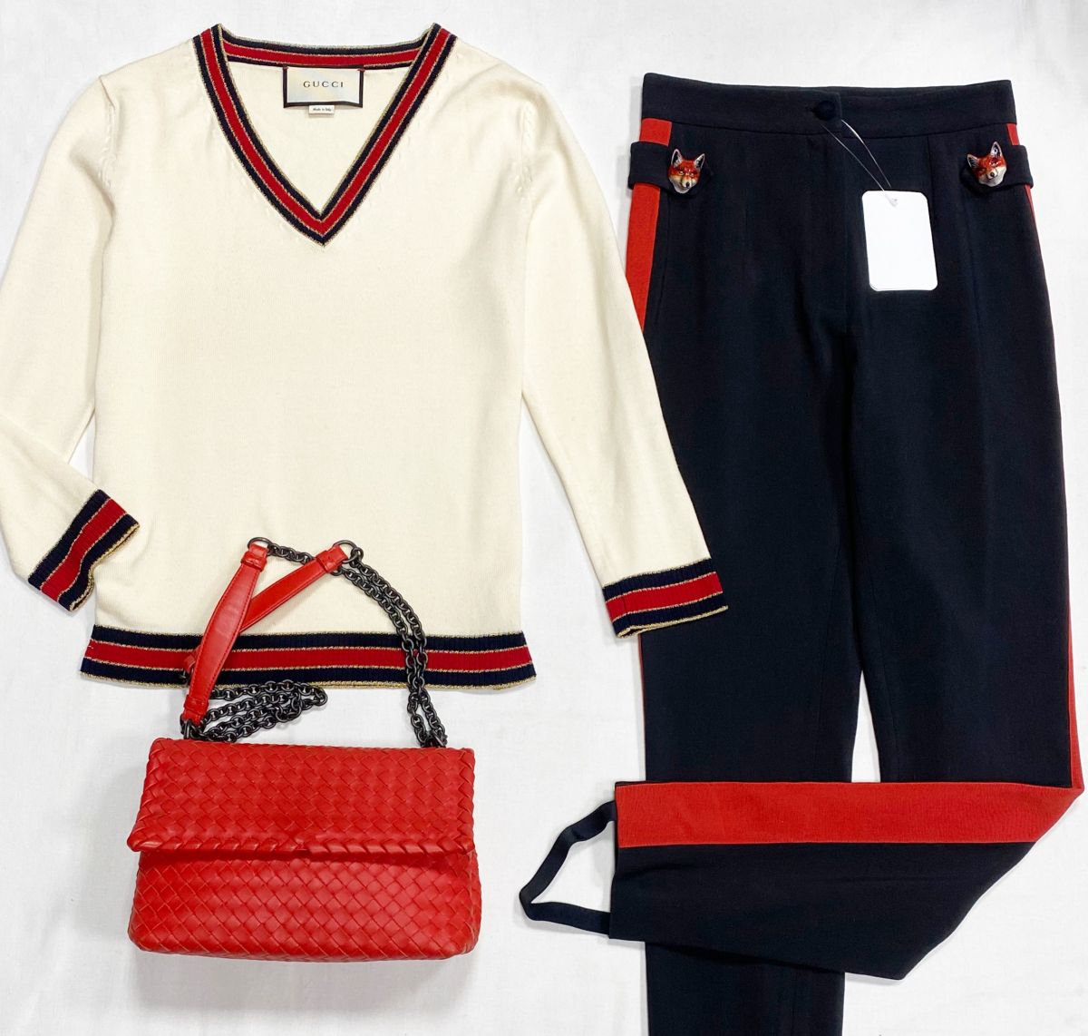 Кофта Gucci размер M цена 31 310 рубБрюки Dolce Gabbana размер 38 цена 26 614 рубСумка Bottega Veneta