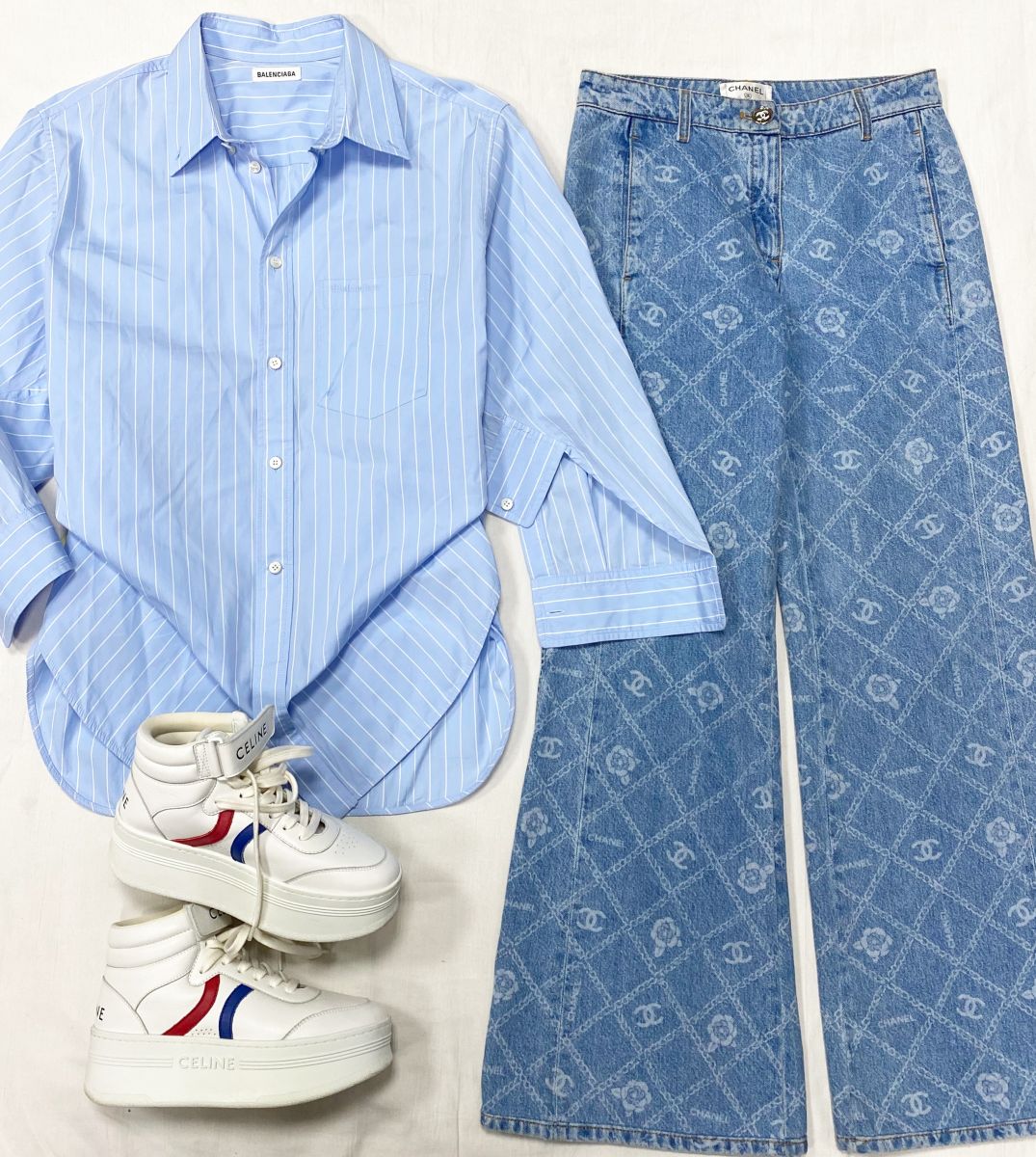 Блузка Balenciaga размер 38 цена 28 179 руб Джинсы Chanel размер 38 цена 46 965 руб Кроссовки Celine размер 37 цена 39 138 руб