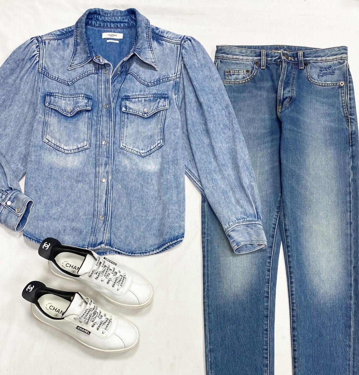 Джинсы Saint Laurent размер 26 цена 15 655 руб
Рубашка Isabel Marant размер 42 цена 10 959 руб
Кеды Chanel размер 39 цена 78 375 руб