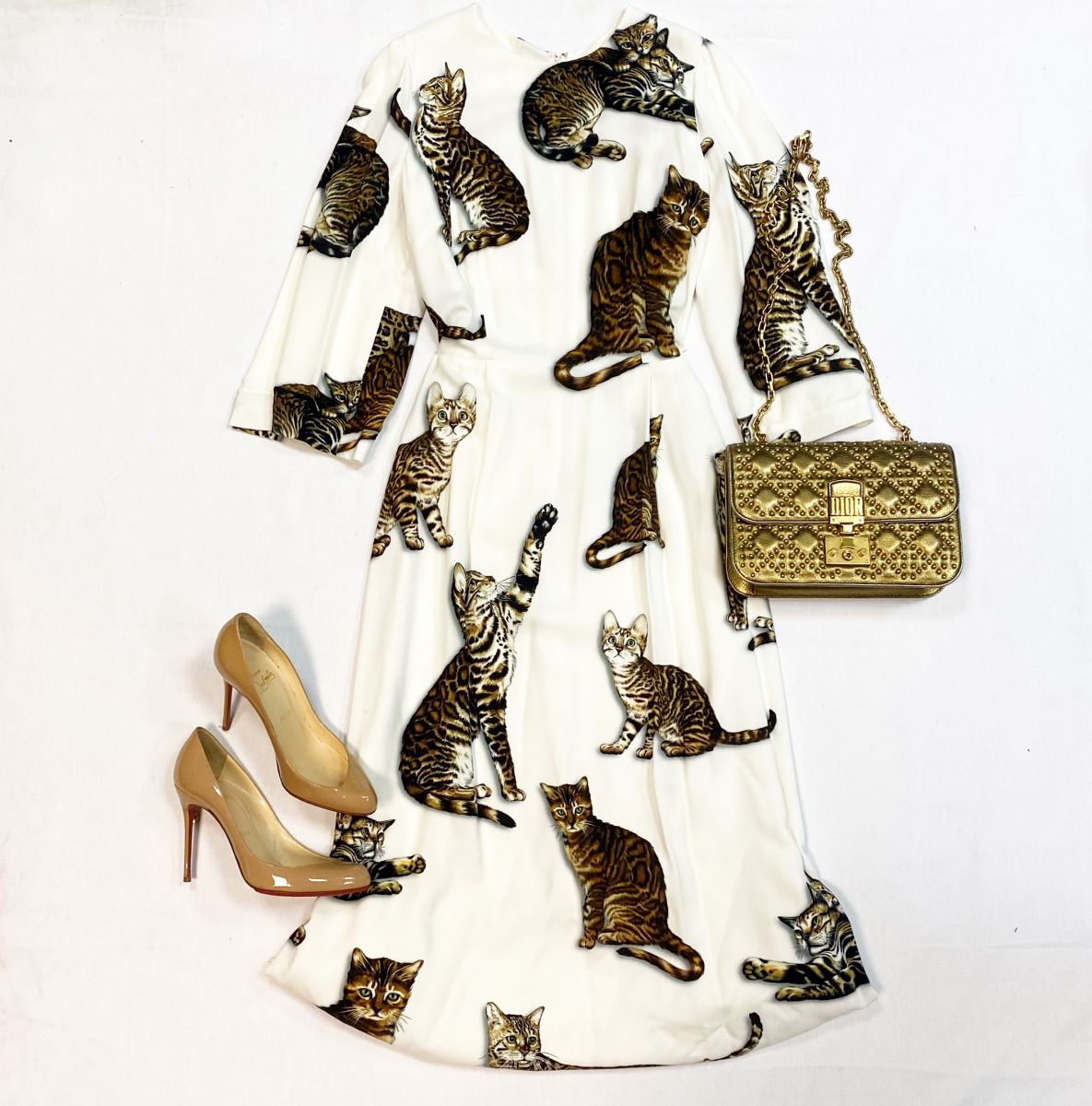 Платье Dolce Gabbana размер 42 цена 30 770 руб
Туфли Louboutin размер 38 цена 15 385 руб
Сумка Dior 