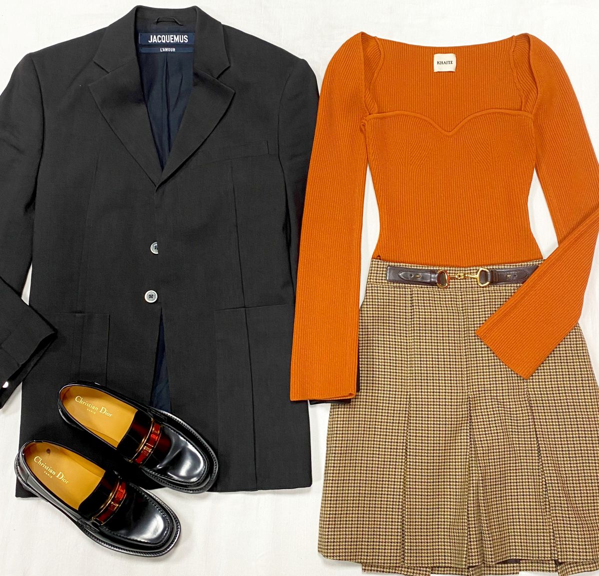 Жакет Jacquemus размер 38 цена 28 179 руб Кофта Khaite размер M цена 23 483 руб Юбка Celine размер 36 цена 23 483 руб Лоферы Christian Dior размер 40 цена 39 138 руб